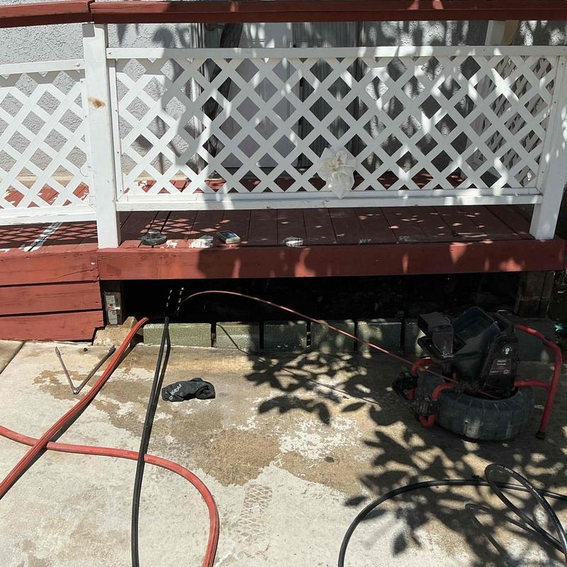 Main sewer line hydro-jetting from clean-out under ramp