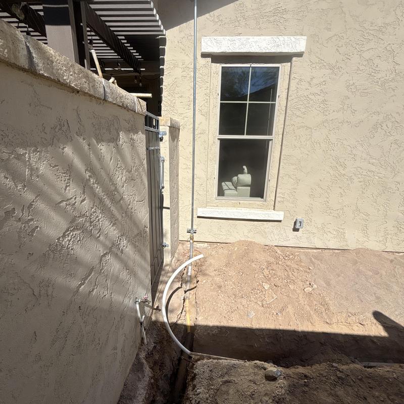 Natural gas line installation with city permit, exterior wall Natural gas line installation with city permit, exterior wall