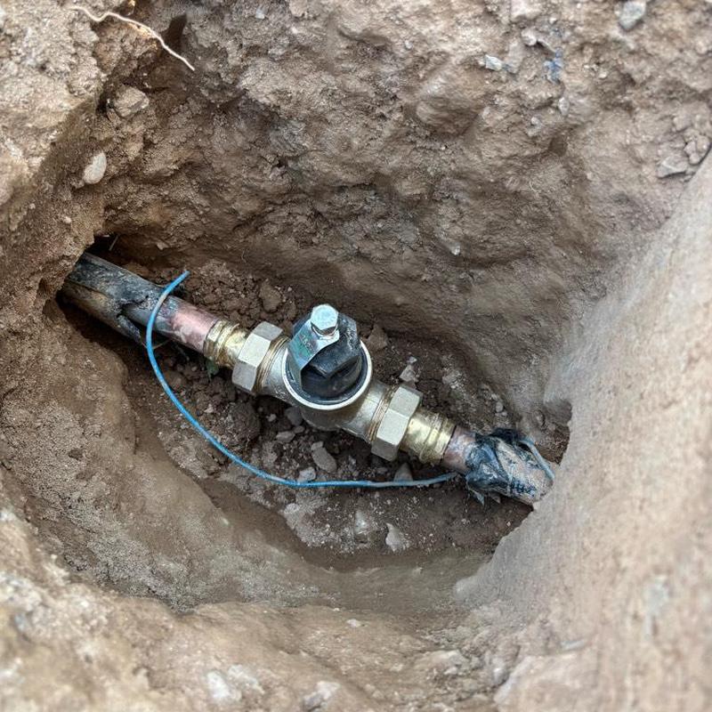 Copper water main with installed pressure regulator valve