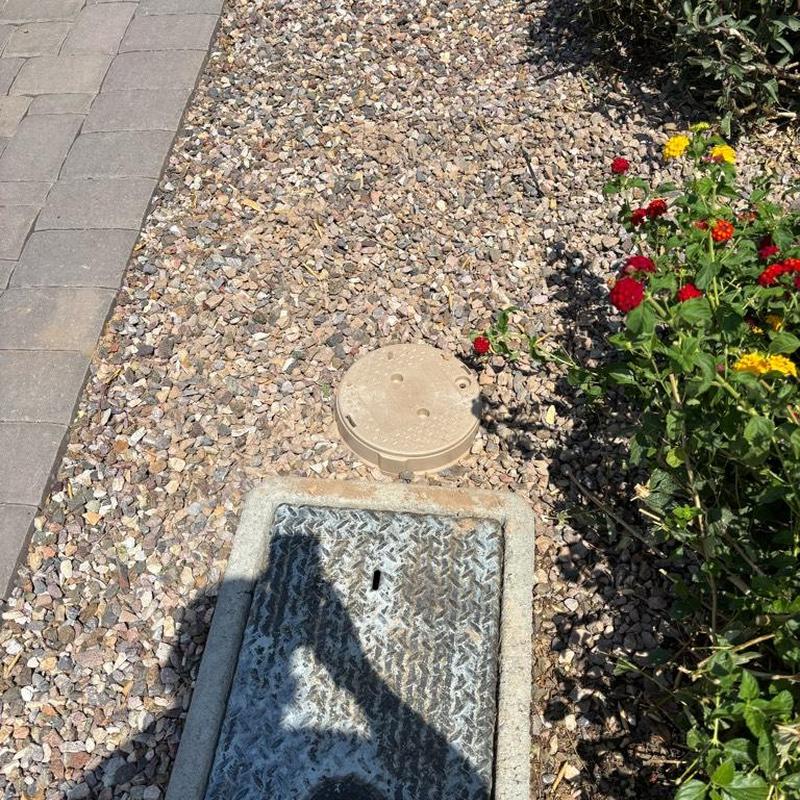 Water main access box and pressure regulator installation site