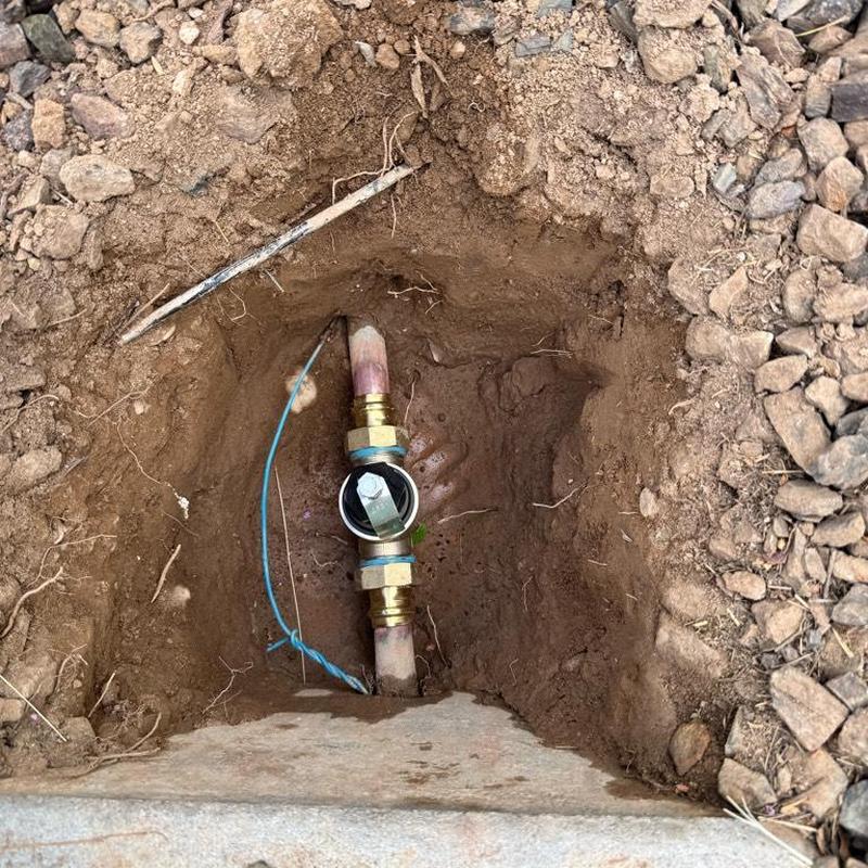 Copper water main with pressure regulator valve installation