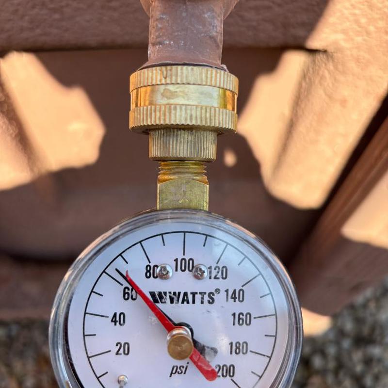 Pressure reducing valve with pressure gauge at 68 psi