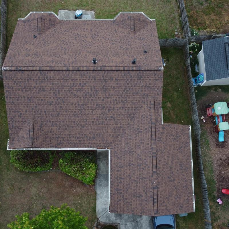 Architectural shingle roof with vents and ridge cap shingles