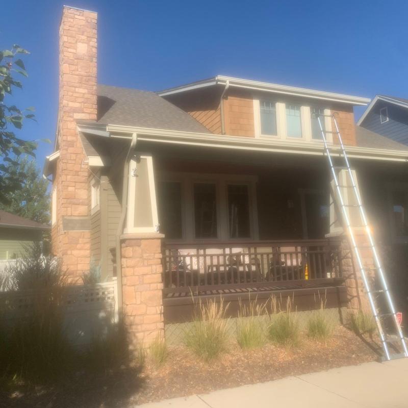 Chimney and step flashing installation on house roof