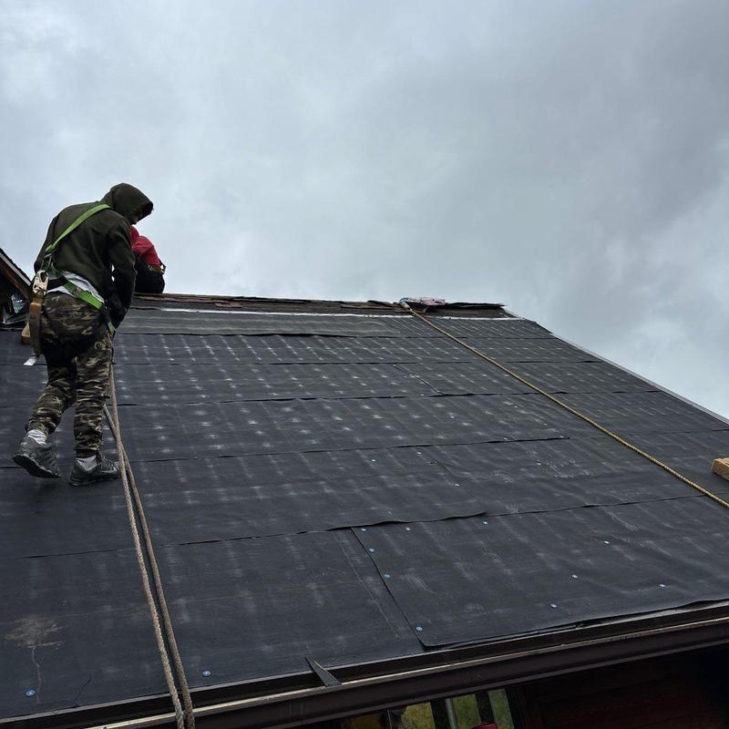 Ice and Water Shield underlayment installation on roof