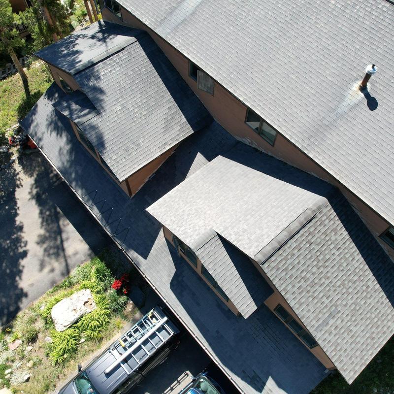 Asphalt shingle roof installation and gutter replacement