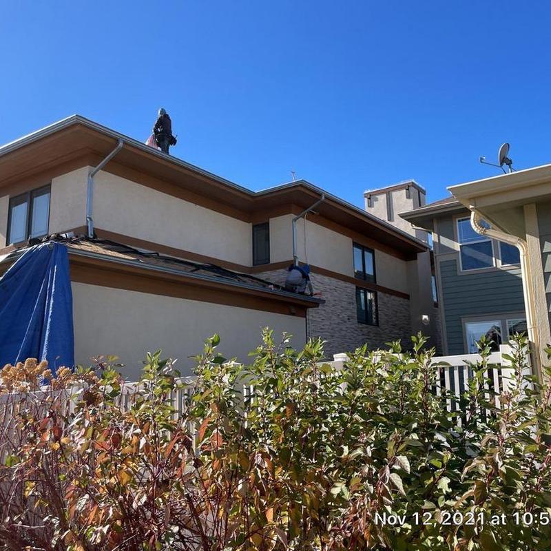Asphalt roof replacement with flashing and painting