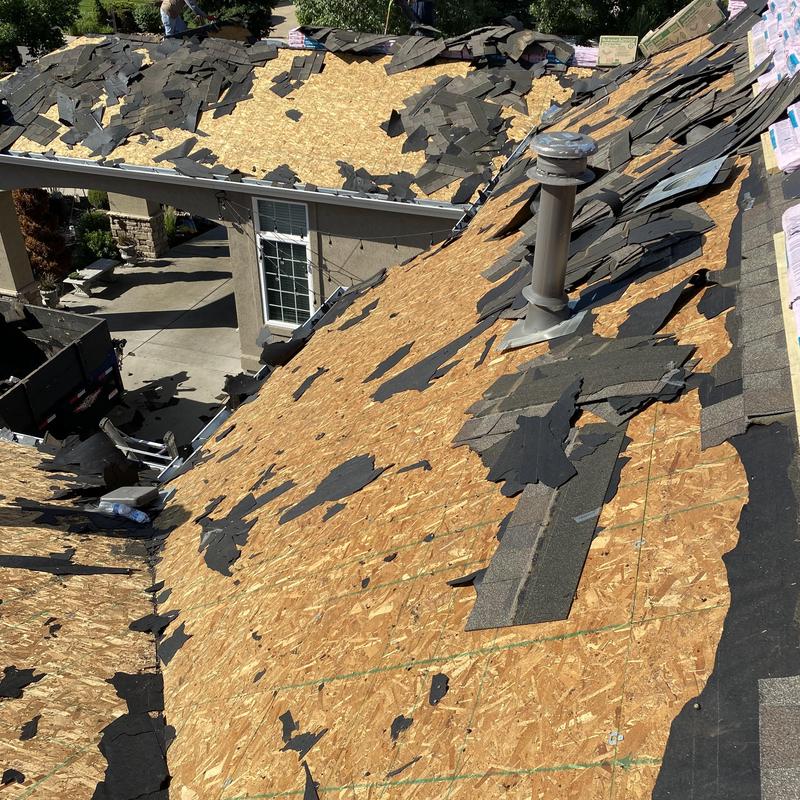 Asphalt shingle roof stripping with exposed plywood decking