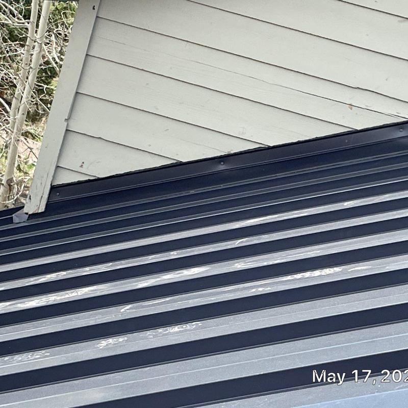 Standing Seam Metal Roof panels installed on slope