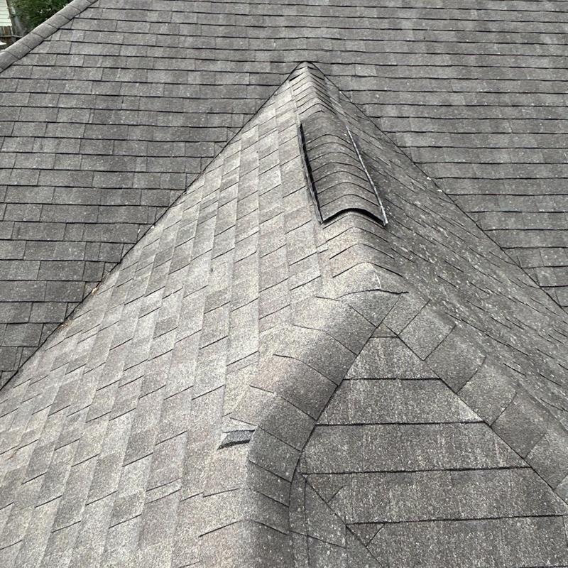 Asphalt shingles with hail impact and granule loss