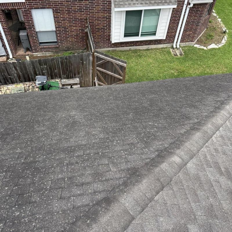 Asphalt shingle roof with hail damage inspection