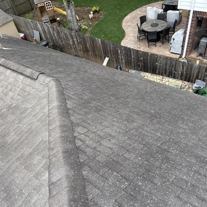 Asphalt shingle roof with hail damage inspection