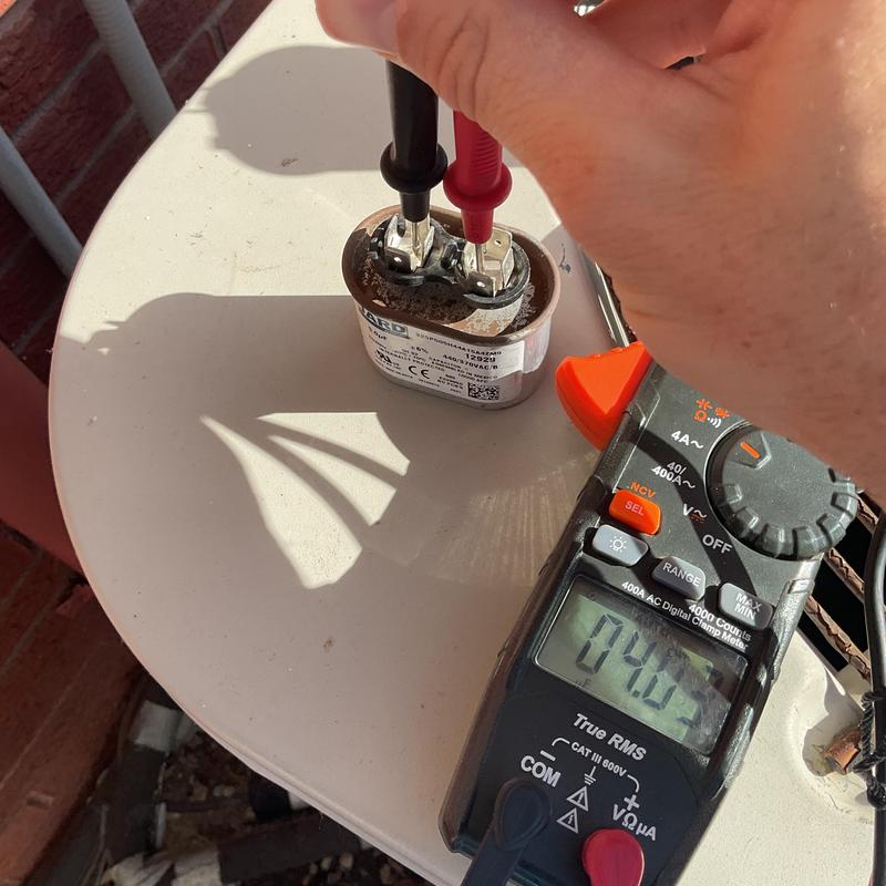 Capacitor testing with digital multimeter on HVAC system