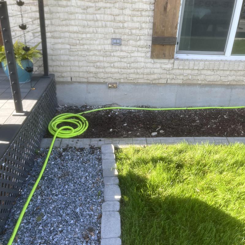 Hose bib faucet installation with isolation loop outdoors