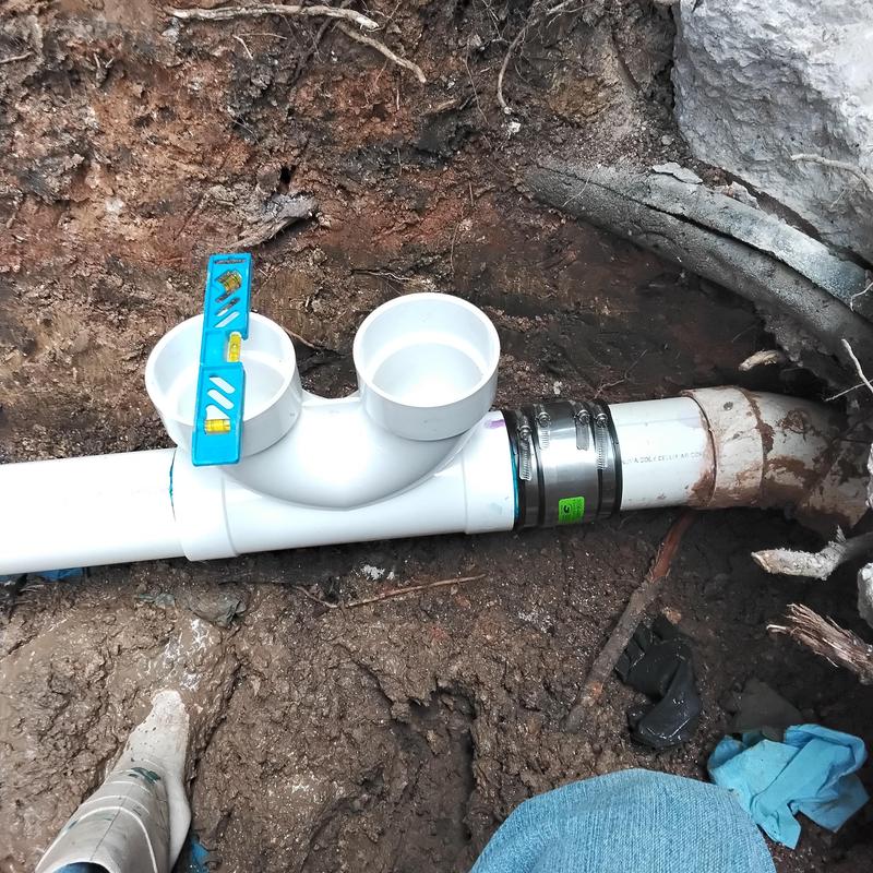Four inch two-way clean out installation with CT bands