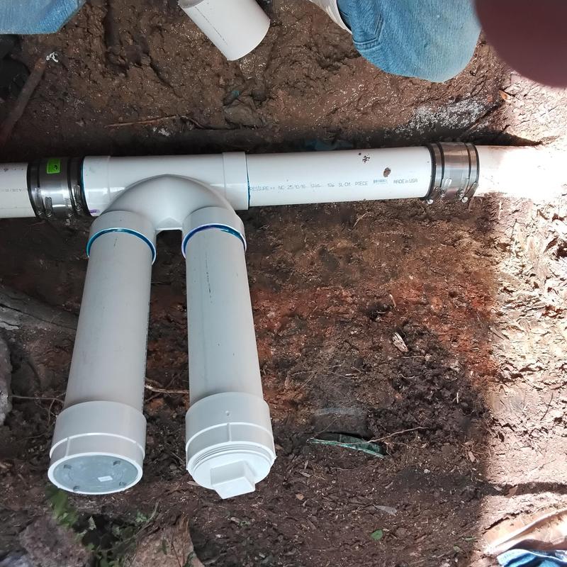 Four inch two-way clean outs with C T bands installation