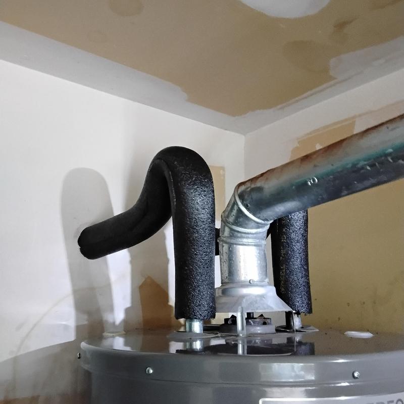 Water heater with insulated flex lines and vent pipe
