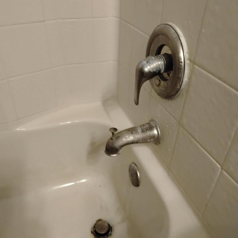 Bathtub faucet and drain with old spout and handle
