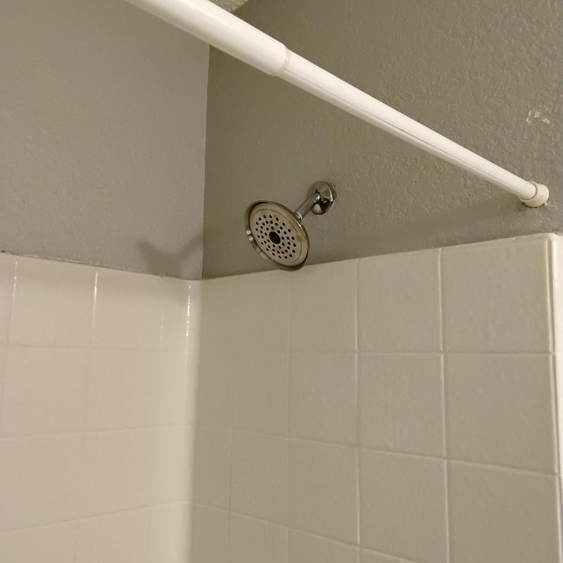 Brushed nickel tub spout and shower head installation