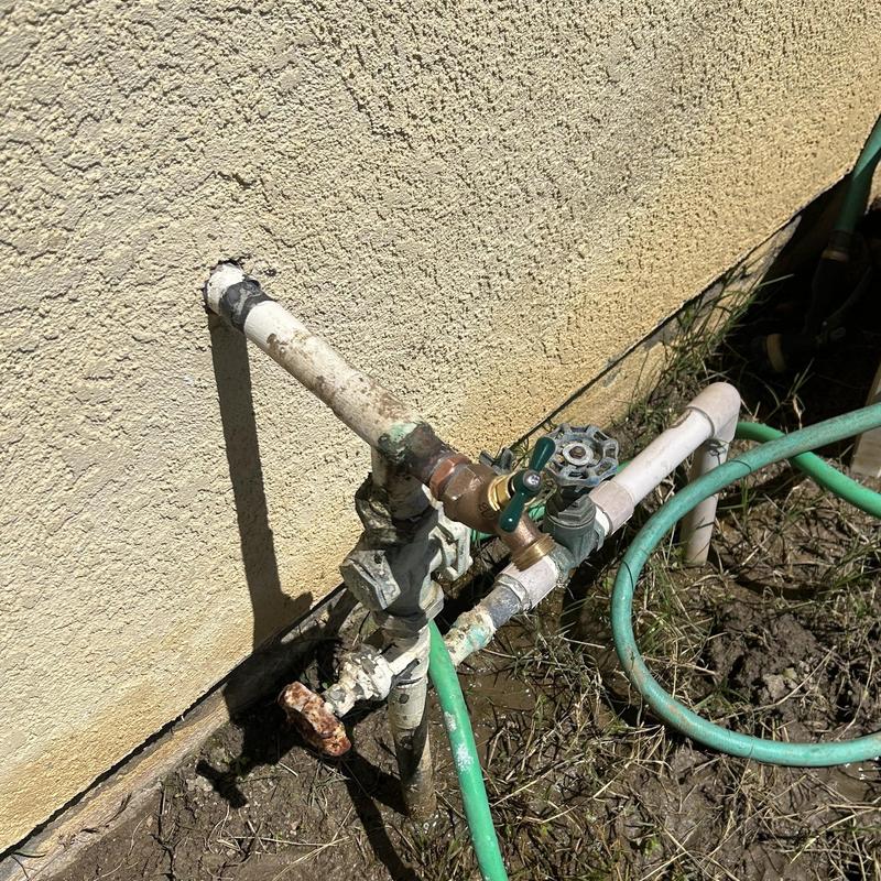 34 Hose bib on water main riser with garden hose