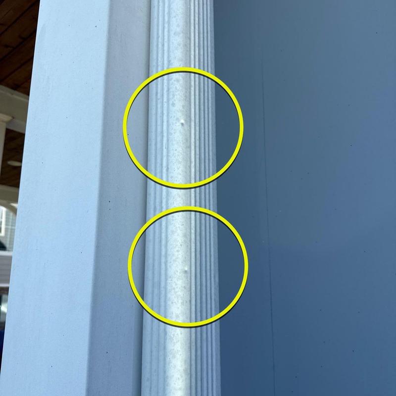 Roof vent pipe with hail damage dents