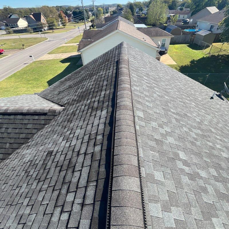 Asphalt shingle roof and ridge vent inspection