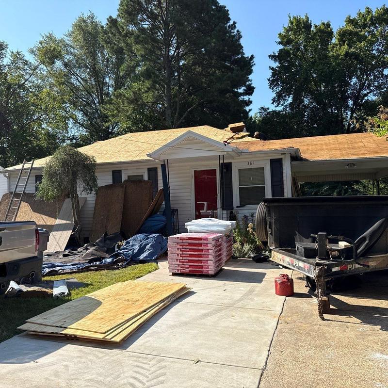 Roof decking installation with new plywood sheets