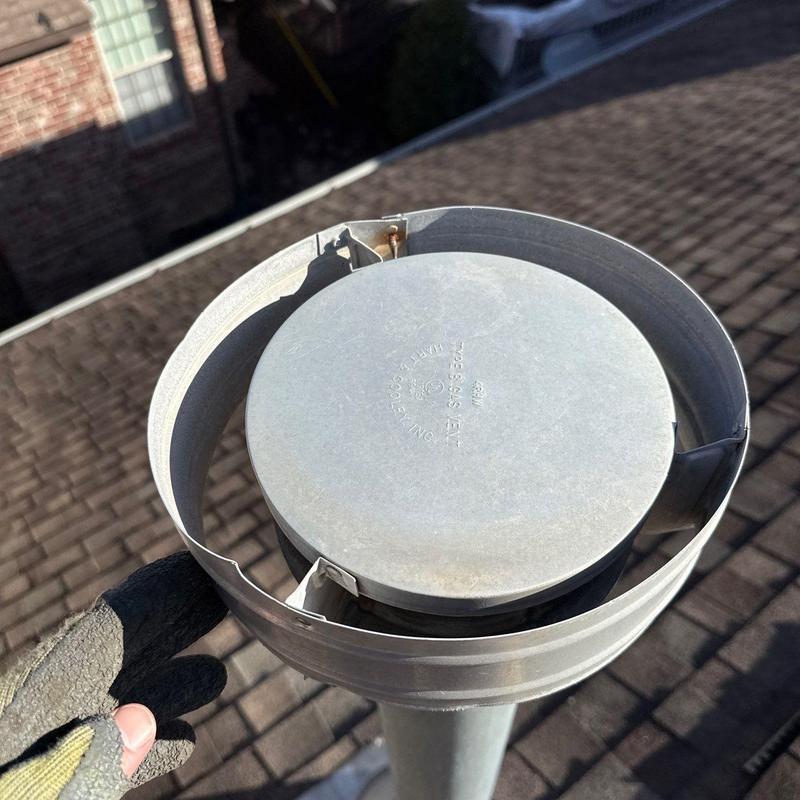 Roof vent cap with damaged metal flashing
