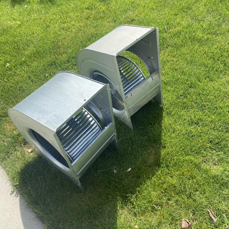 HVAC blower wheels removed for maintenance outdoors