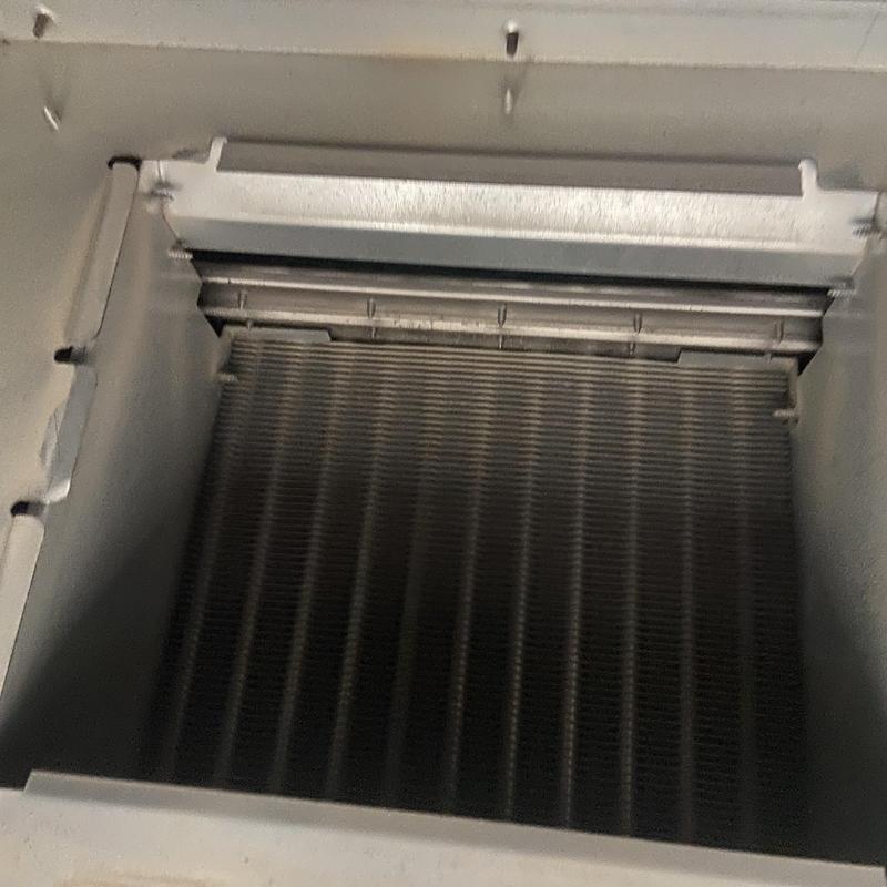 HVAC unit evaporator coil inside housing