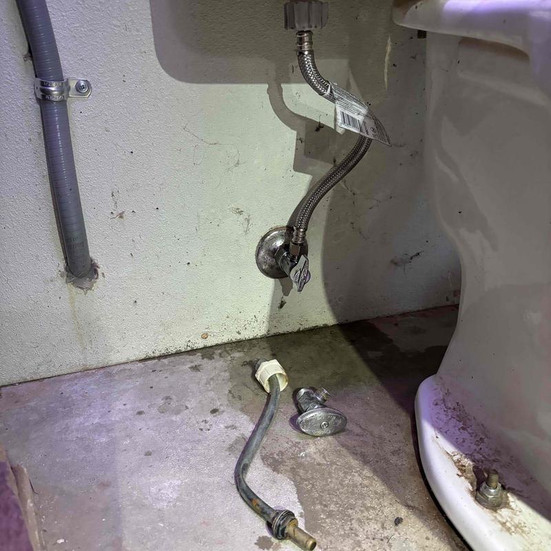 Emergency stop valve disassembled near garage bathroom toilet