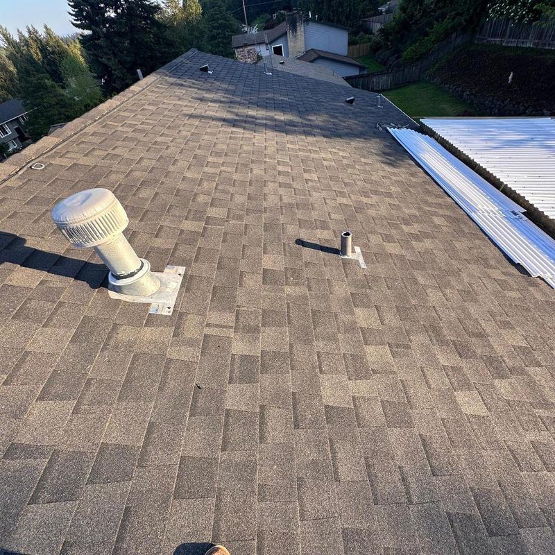 Shingle roof with vent installations in Bothell, WA