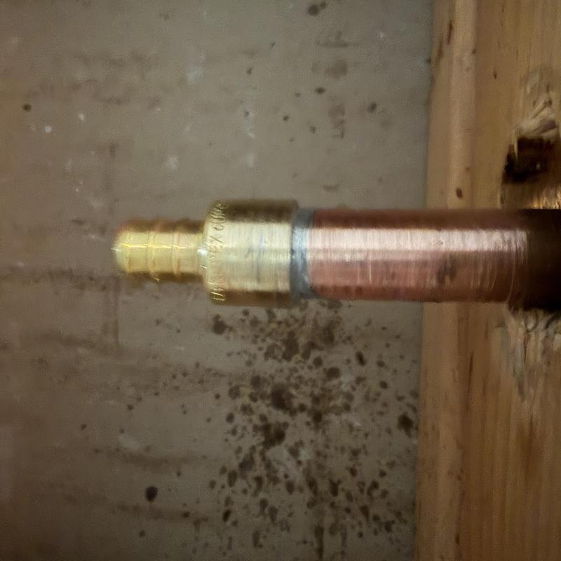 Hose bib connection with new brass fitting installed