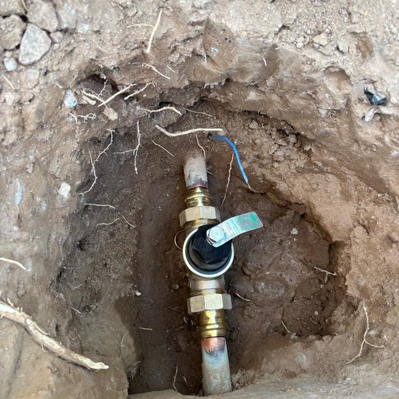 One inch pressure relief valve with access box in dirt