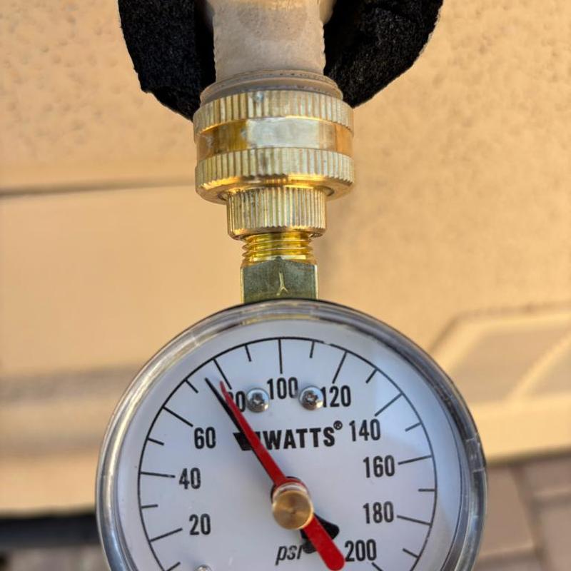 Pressure reducing valve gauge showing 75 psi setting