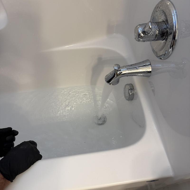 Tub drain with flowing water in Midlothian bathroom Tub drain with flowing water in Midlothian bathroom