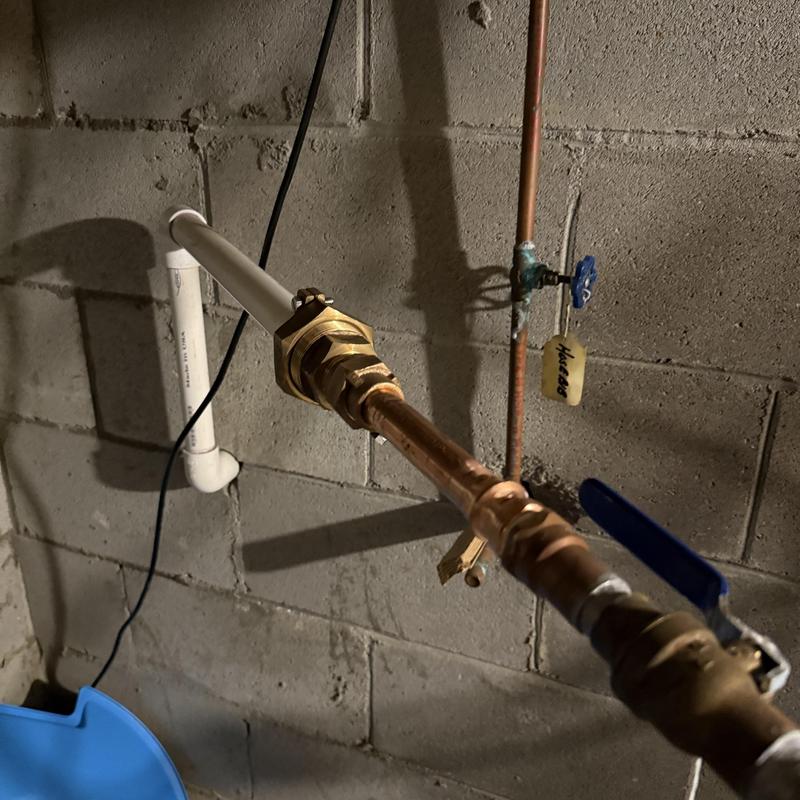 Yard sprinkler system waterline with valves in basement Yard sprinkler system waterline with valves in basement