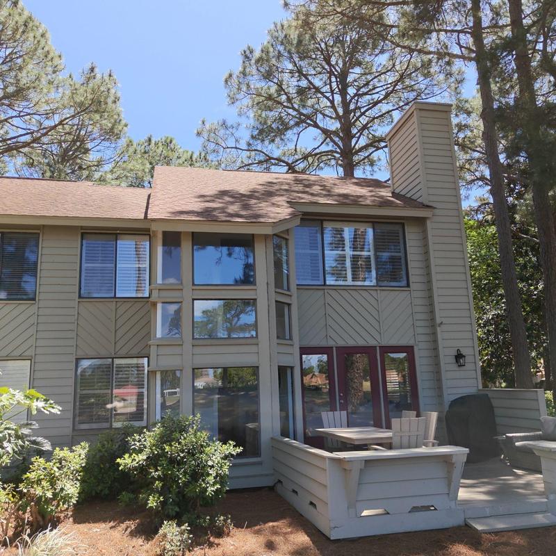 Roof flashings and pine straw removal at house exterior Roof flashings and pine straw removal at house exterior