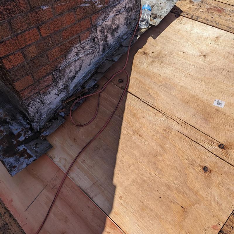 Roof decking replacement near chimney with prep work Roof decking replacement near chimney with prep work