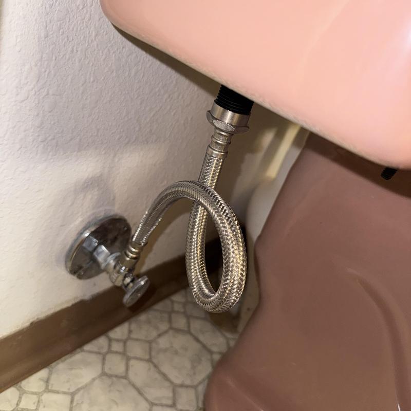 Toilet supply line and angle stop installation under tank