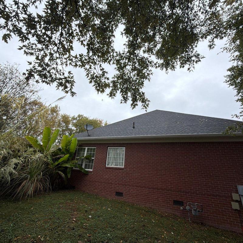 Asphalt shingle roof with hail damage inspection