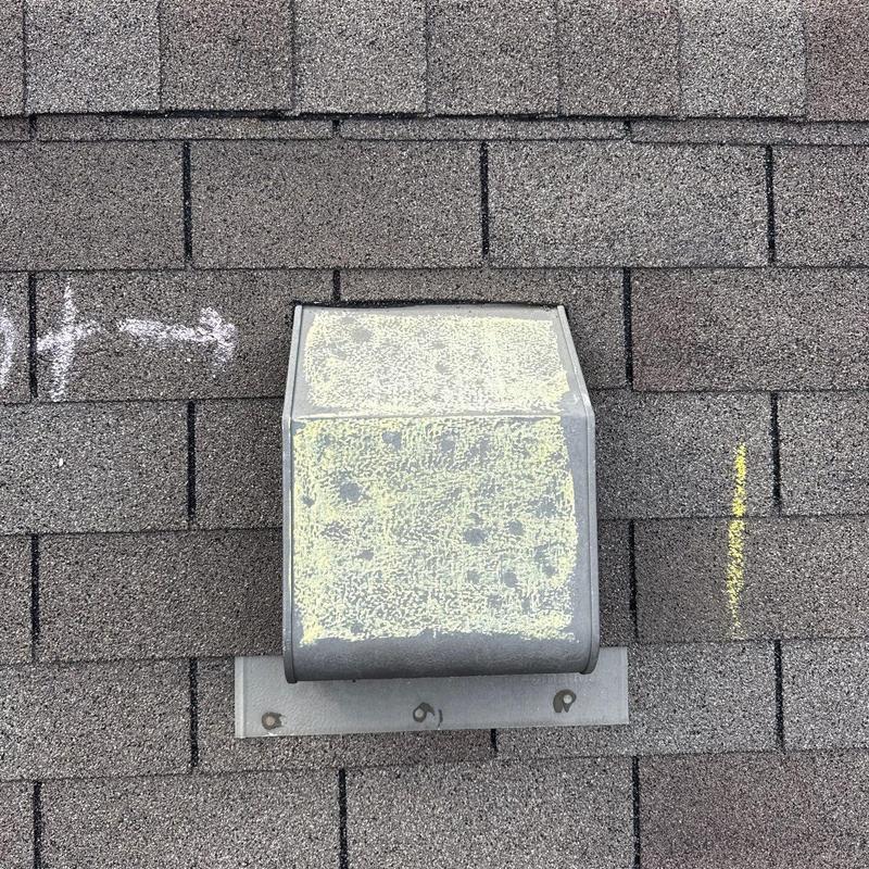 Ridge vent with hail damage and chalk markings