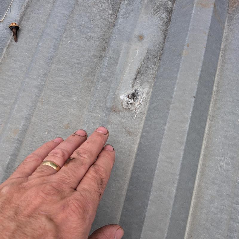 Metal roof screw replacement on old roof panel Metal roof screw replacement on old roof panel