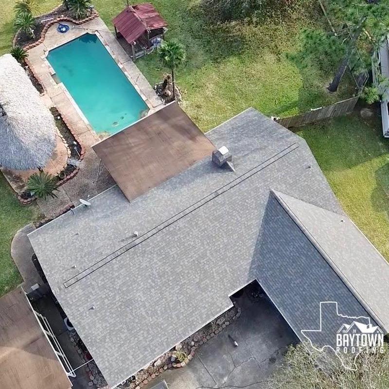 Owens Corning Oakridge shingle roof with pool backyard