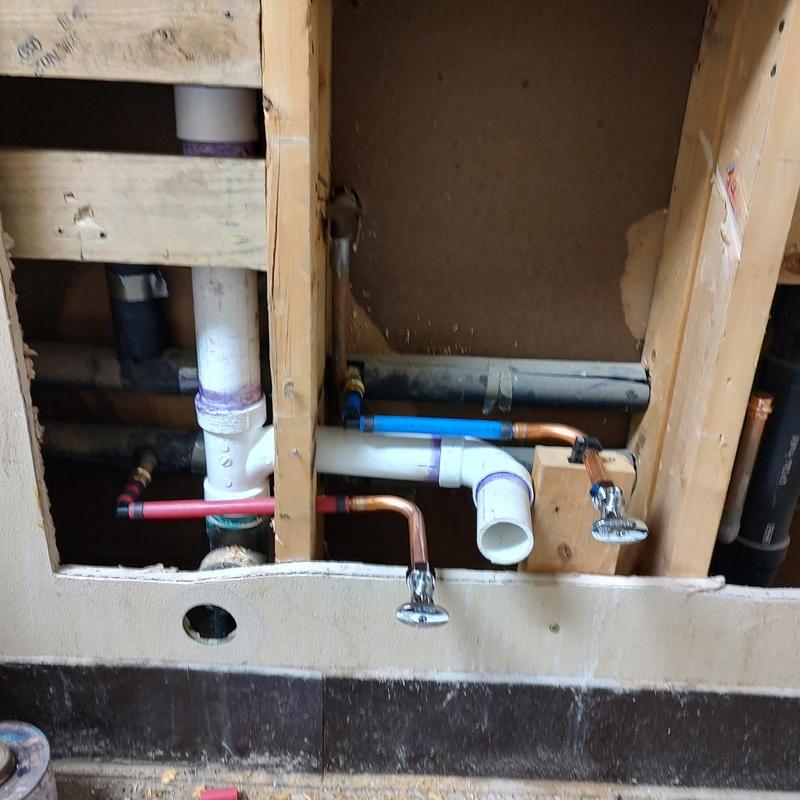 Mop sink water supply pipes with shutoff valves Mop sink water supply pipes with shutoff valves
