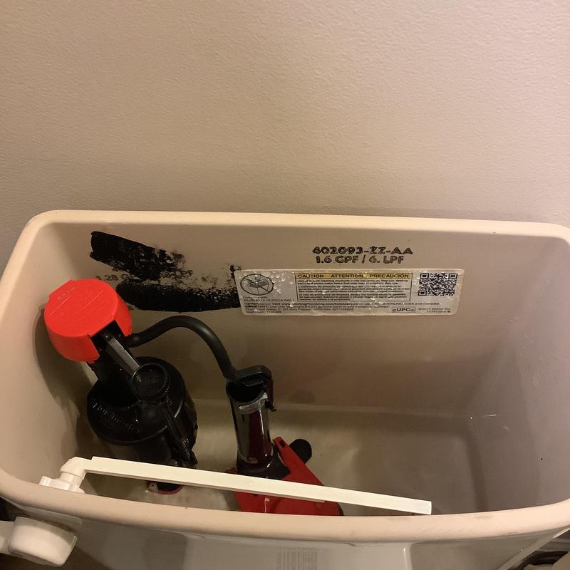 Sterling toilet tank with flush valve assembly Sterling toilet tank with flush valve assembly