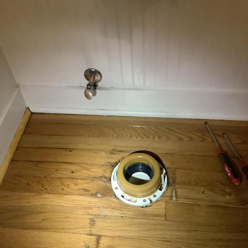 Toilet flange installation on hardwood floor with water valve Toilet flange installation on hardwood floor with water valve