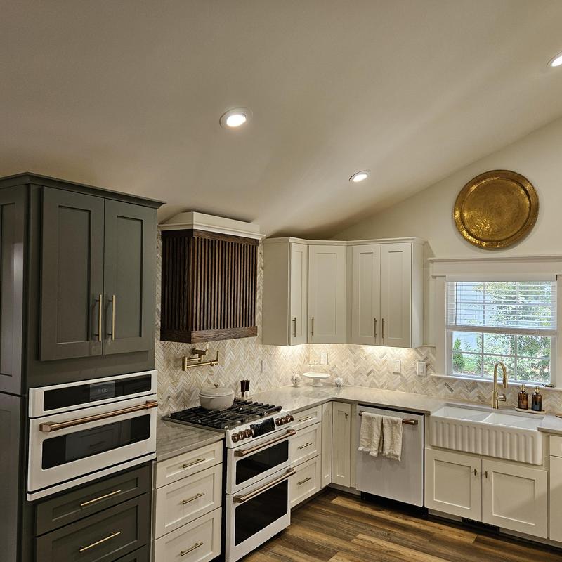 Farmhouse sink and countertop with modern cabinetry