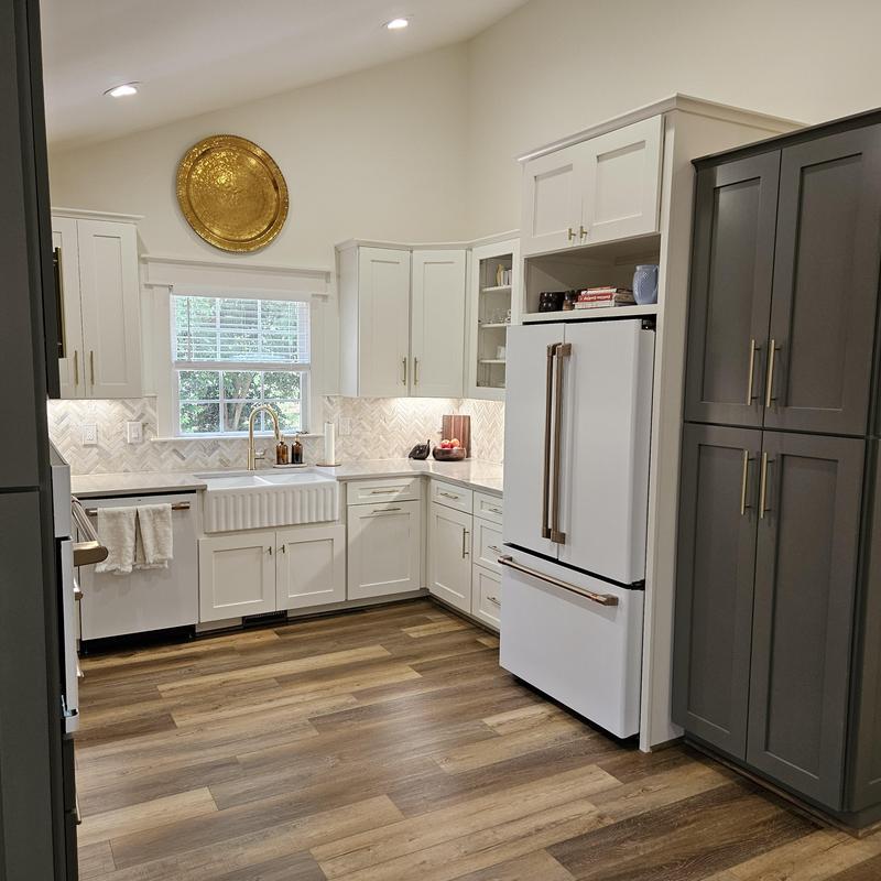 Farmhouse sink and white cabinetry kitchen remodel