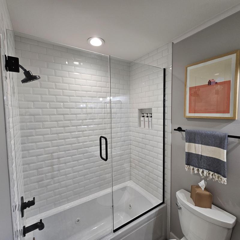 Shower and bathtub enclosure with tile surround Shower and bathtub enclosure with tile surround